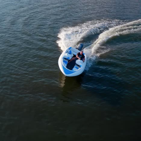 motor boat floats on river