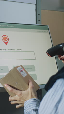 warehouse worker scanning a package