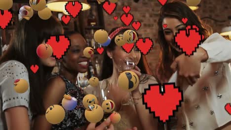 Emoji-icons-with-a-group-of-friends-taking-a-selfie-in-the-background