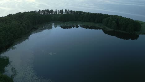 Aerial-view-of-the-lake-bay-with-calm-blue-water