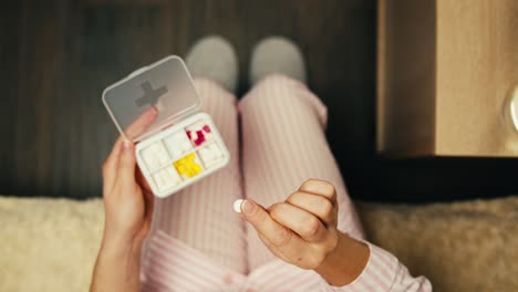 woman taking medication