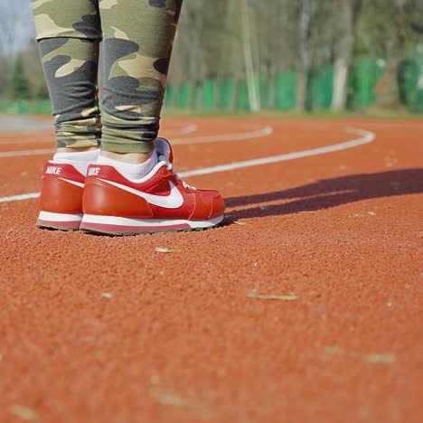 athletic pair of legs going for a jog - healthy lifestyle concept