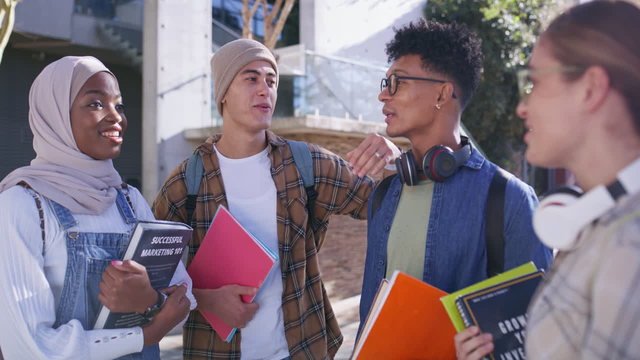 Diverse group of students discussing studies on campus