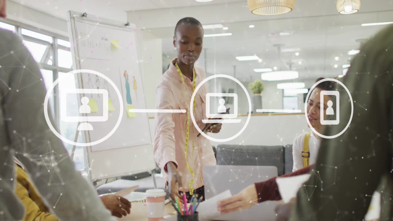 Animation of icons with connections and data processing over diverse business people in office