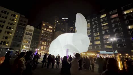 a giant 50 foot rabbit in downtown pittsburgh by the fire and ice plaza for the city's first night celebrations. pittsburgh downtown market square during christmas holiday season