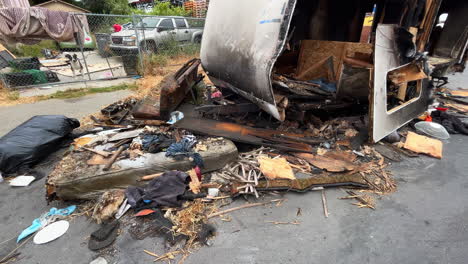 vandalized and burned trailer on the street