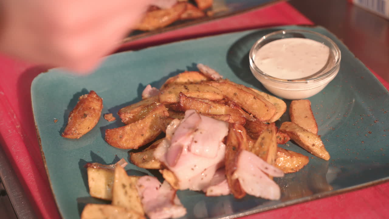 Pile of baked potatoes. Well spiced roasted potato served as main dish