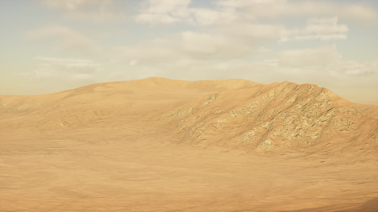 사막의 모래 언덕 위에 해가 지는 것