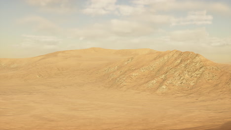 sunset over the sand dunes in the desert