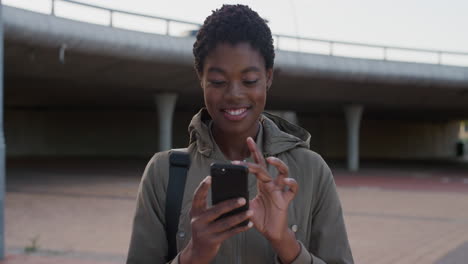 portrait-young-african-american-woman-using-smartphone-texting-browsing-enjoying-online-communication-on-mobile-phone-slow-motion