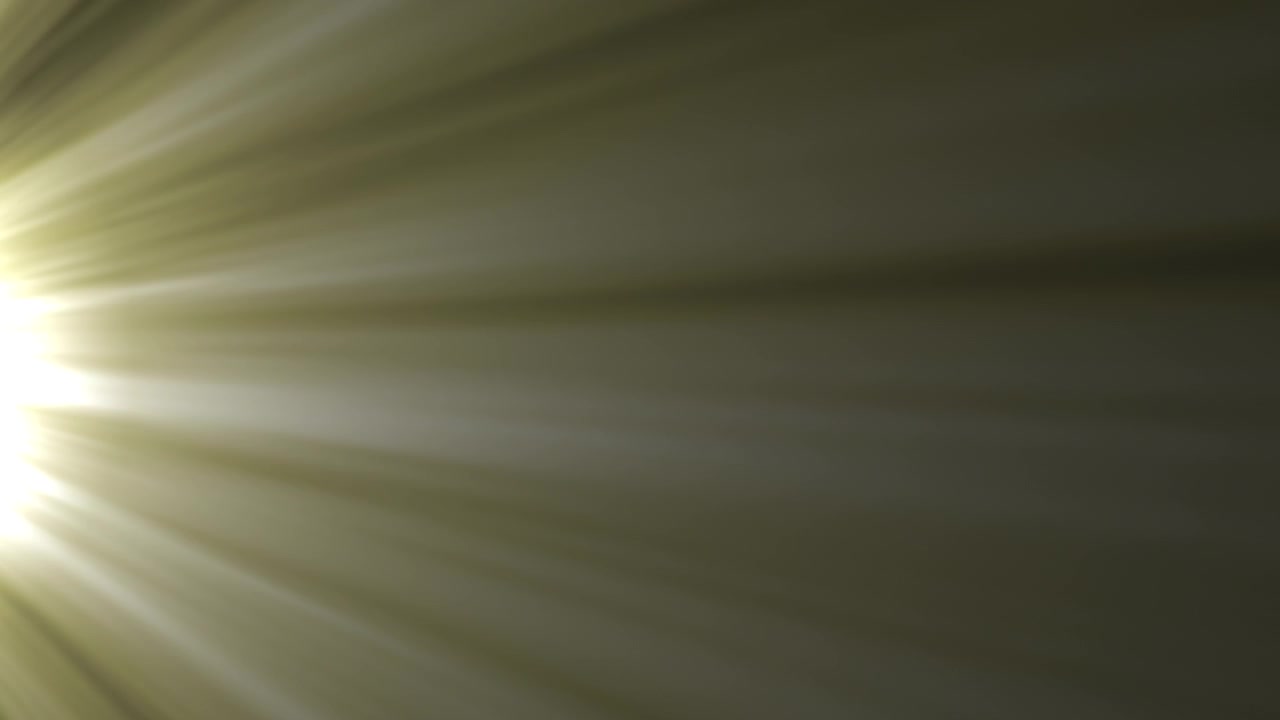 Abstract Golden Light Rays Moving Across Dark Background
