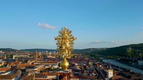 4k aerial drone video of the ornate steeple of st mary's chapel in downtown würzburg, germany