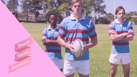animation of pink ribbon logo with hope text over rugby players outdoors