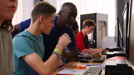 design students working on computers in cad/3d printing lab