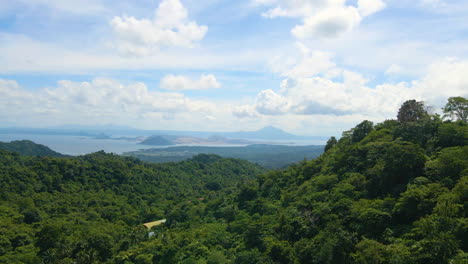 dolly in aerial shot of taal volcano in tagaytay city, philippines