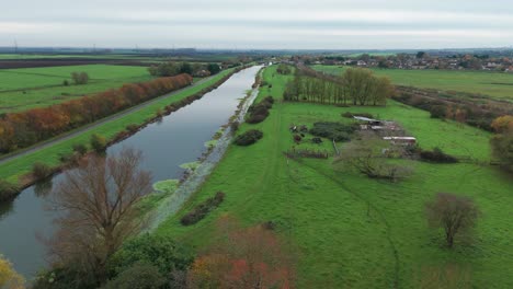 aerial view of canal and countryside in autumn