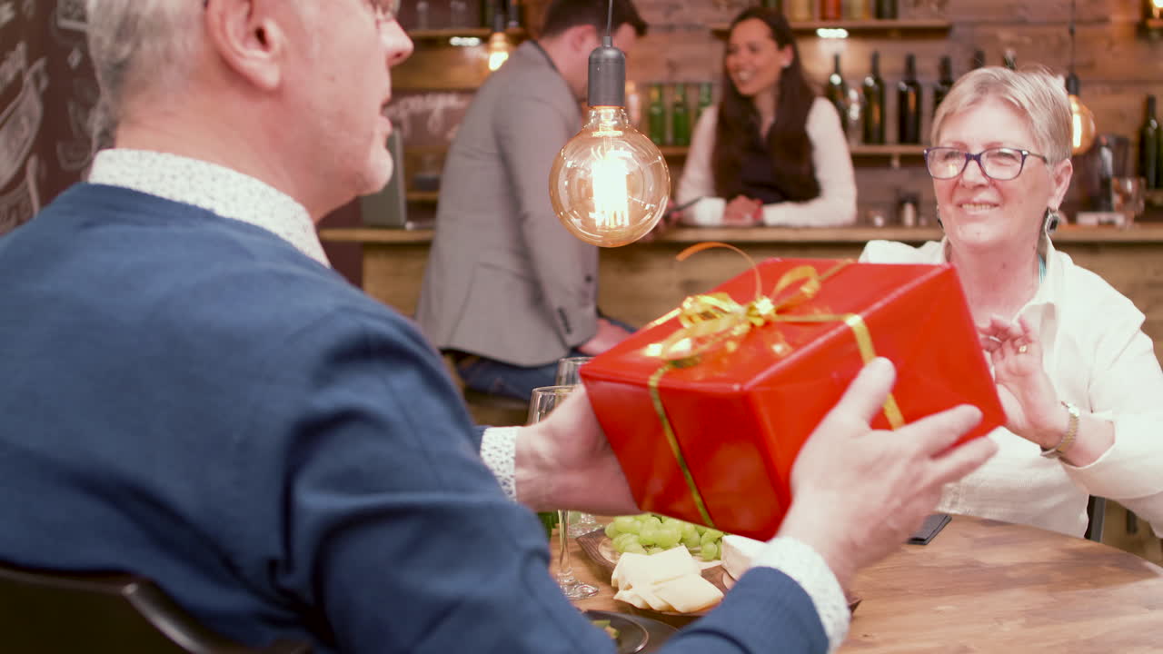 People enjoying a romantic dinner at a restaurant