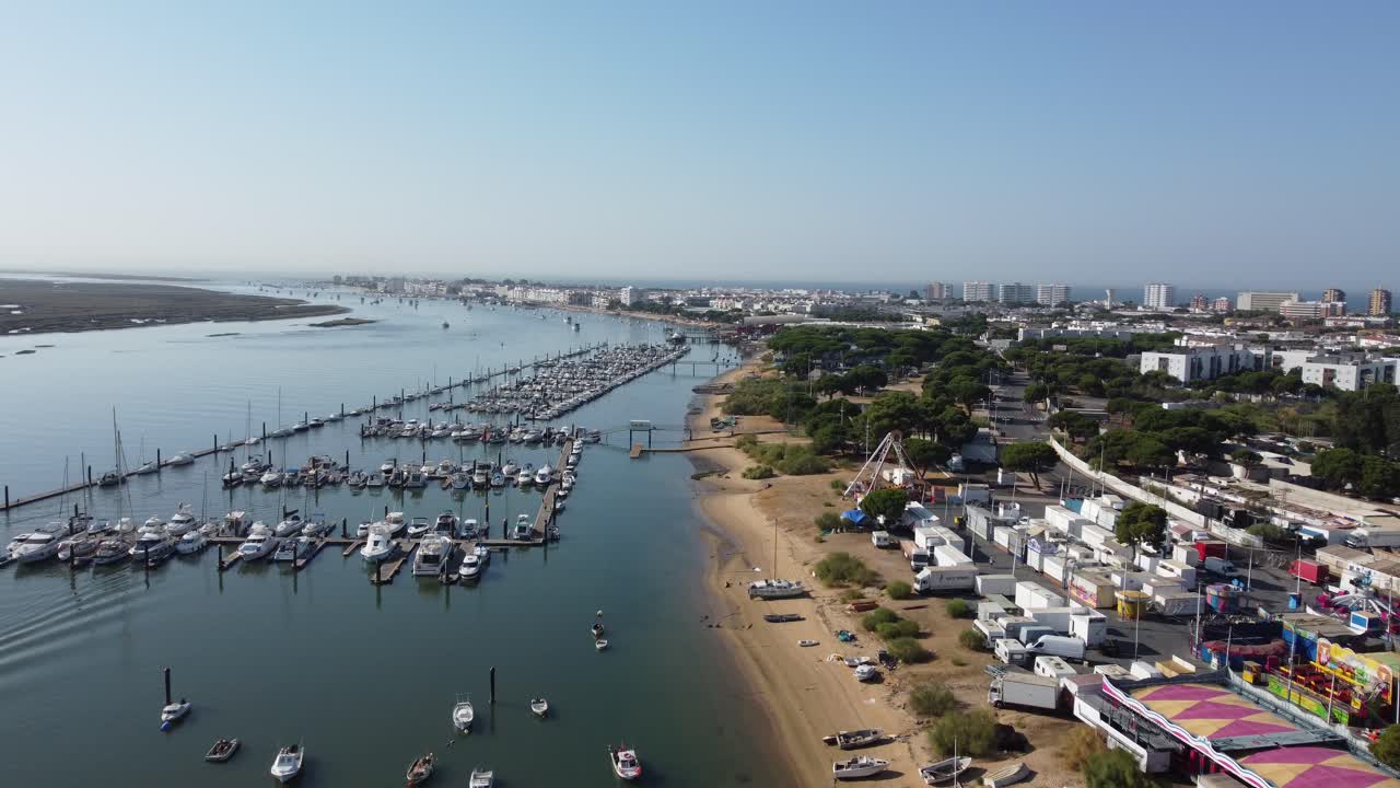 Aerial shot in Punta Umbria, where the drone follow the river down stream
