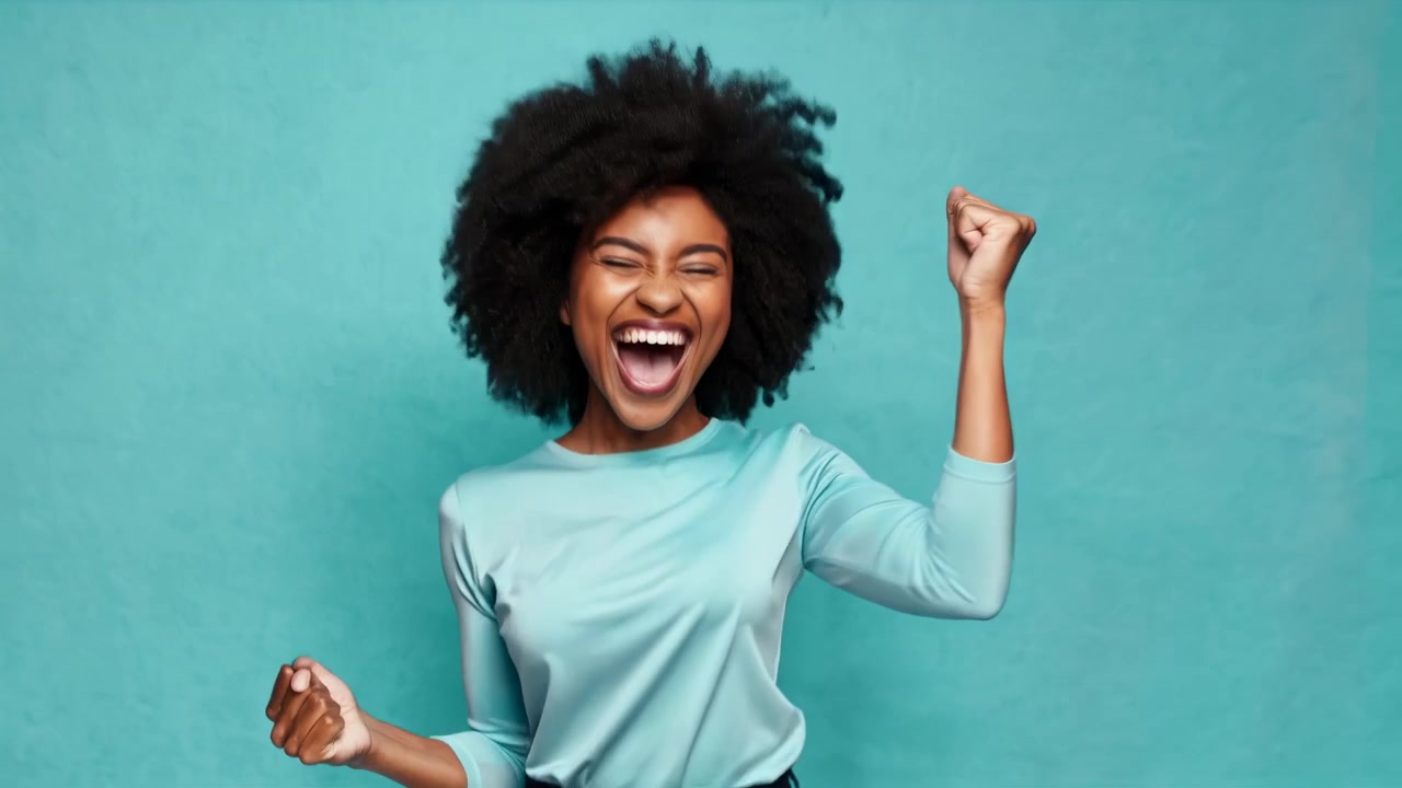 Excited African American Woman Cheering with Fists Raised