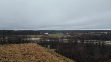 Flying-towards-Interstate-80-and-cars-are-traveling-in-the-middle-of-winter-in-a-fog