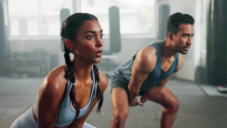 Class,-fitness-and-kettlebell-with-couple-in-gym