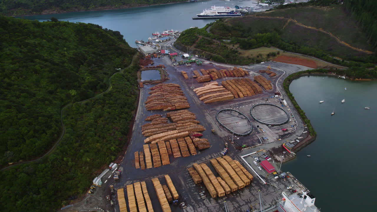 Aerial view overlooking a timber yard at Shakespeare Bay, in Picton, NZ