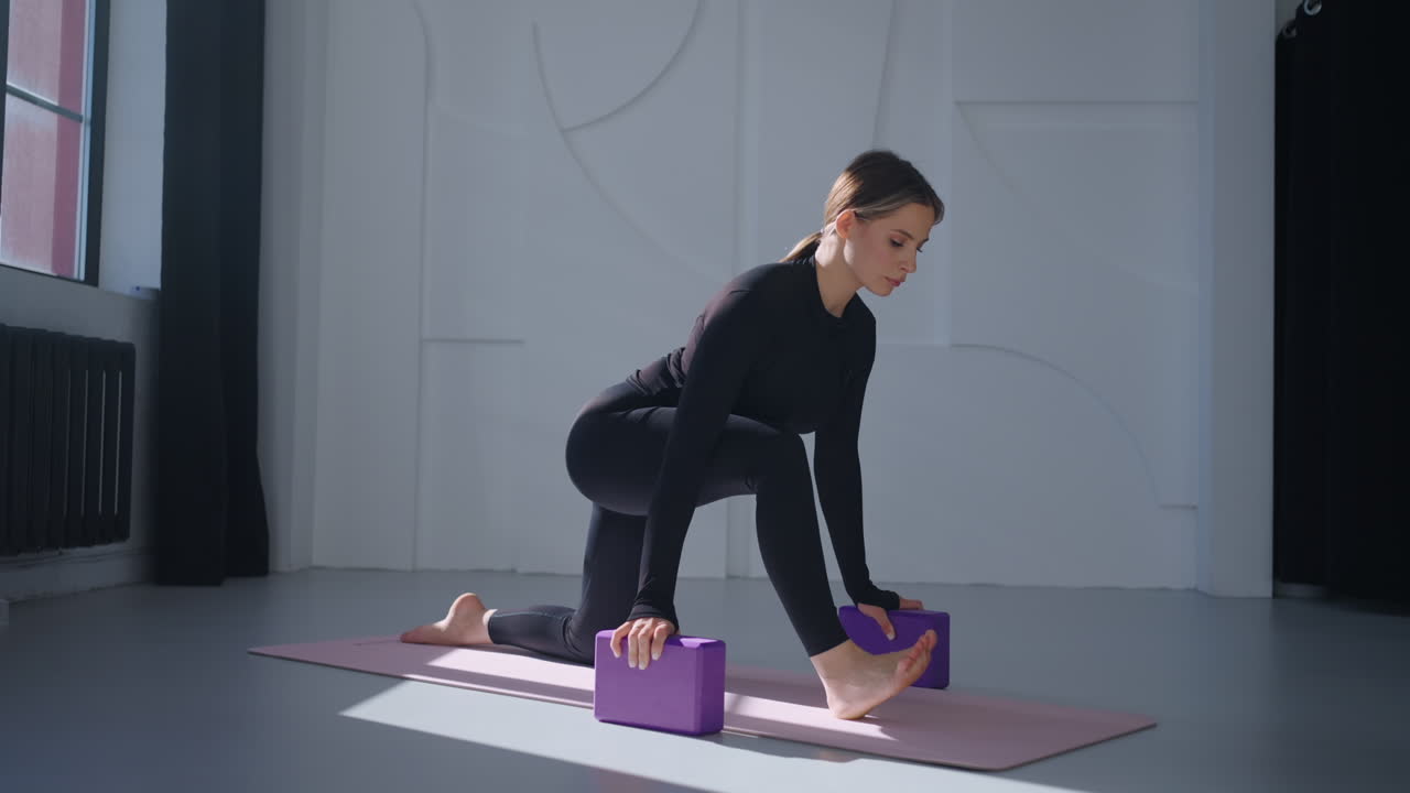 Woman stretching in yoga class