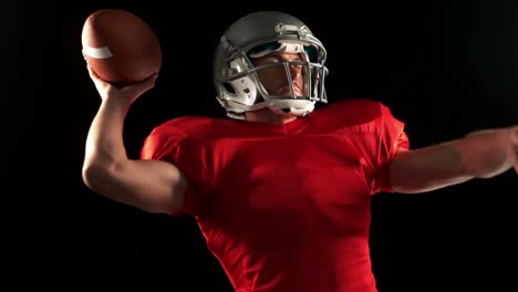 american footblall player with red jersey playing