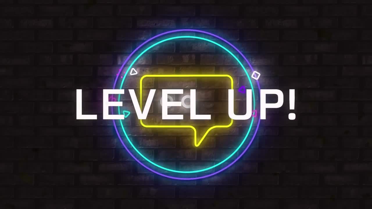 Digital animation of level up text over neon yellow message icon on round banner against brick wall