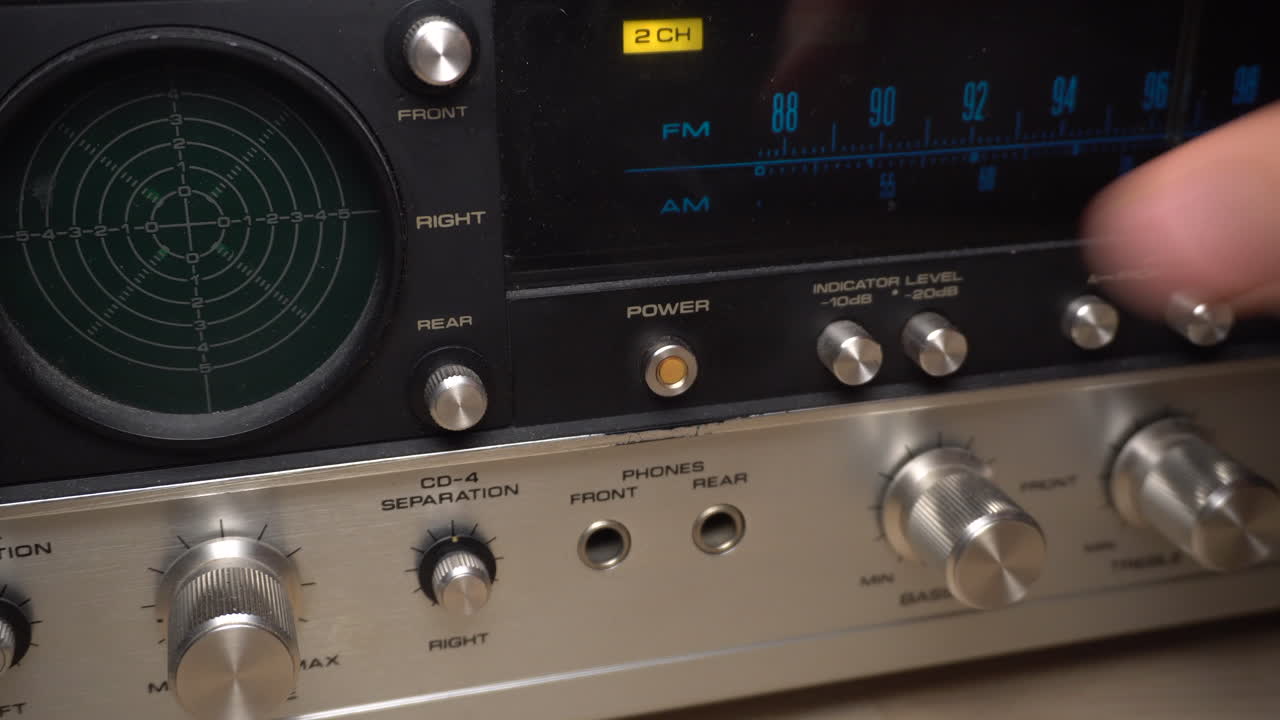 Powering on an old amplifier and turning it off again.