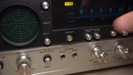 powering on an old amplifier and turning it off again.