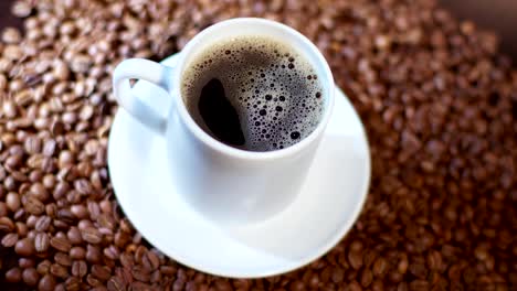 white cup is filled with a stronger bitter coffee drink