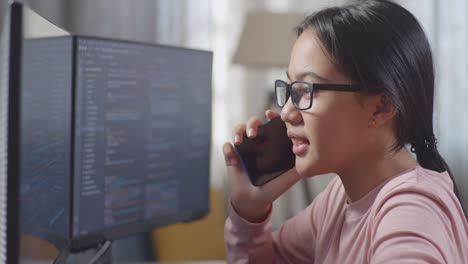 woman programmer on phone call