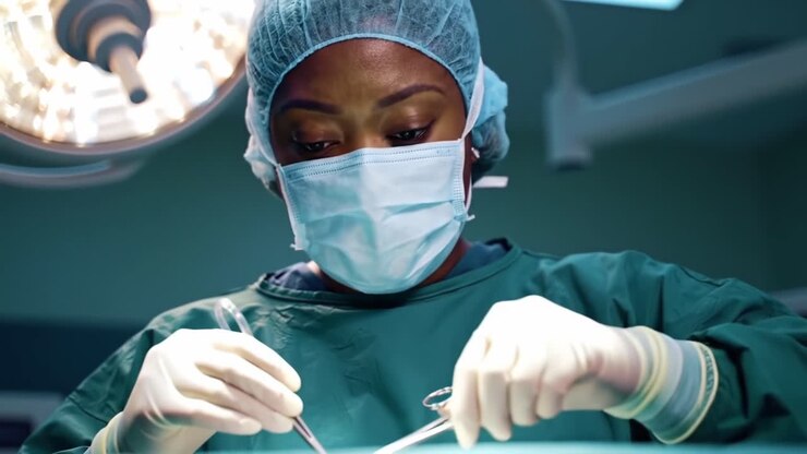 Focused Surgical Procedure: A Healthcare Professional Demonstrating Expertise and Precision in an Operating Room Environment