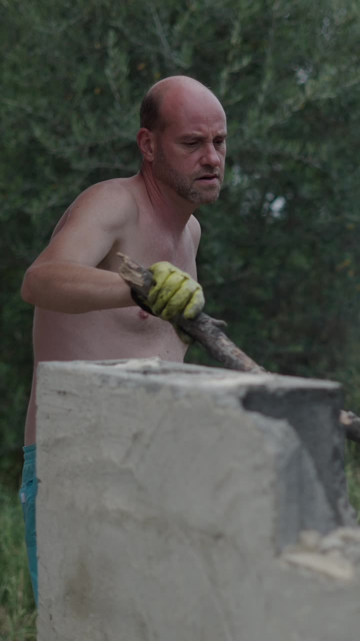 Man working on concrete construction