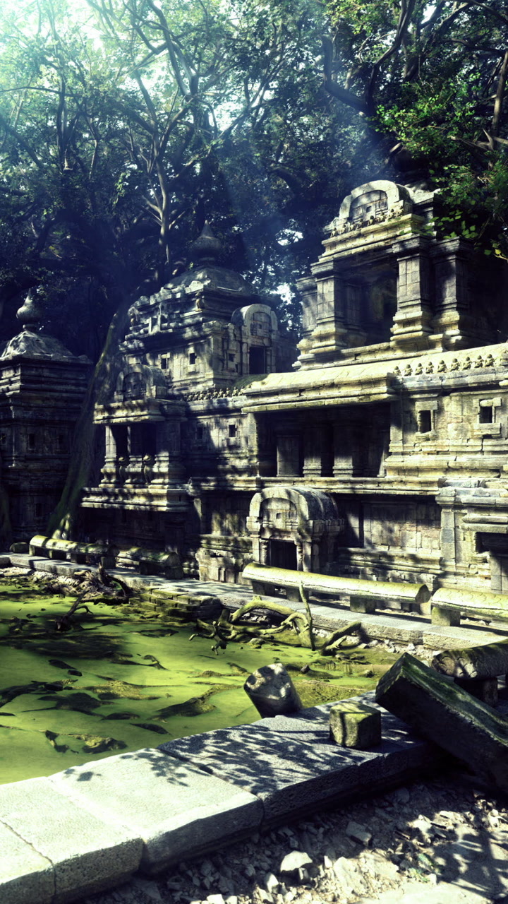 Ancient ruins reflect a forgotten past amidst lush greenery and still waters