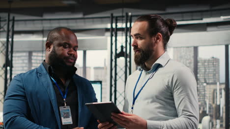 vertical video businessmen analysts monitoring efficiency insights at the workspace