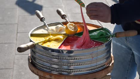 street vendor making colorful turkish delight