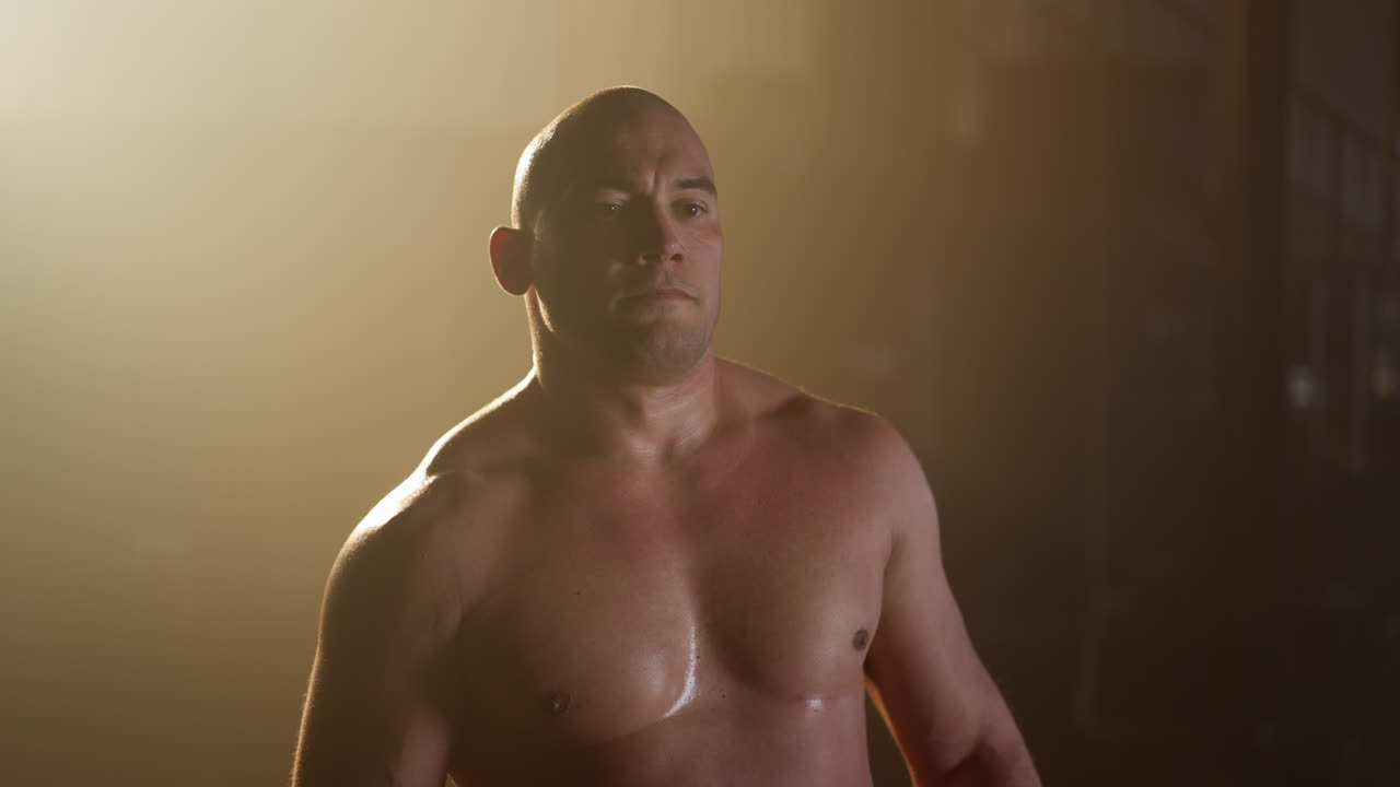 Muscular Bald Man Training