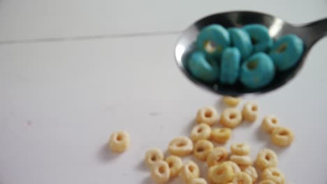 cereal rings in spoon 4k