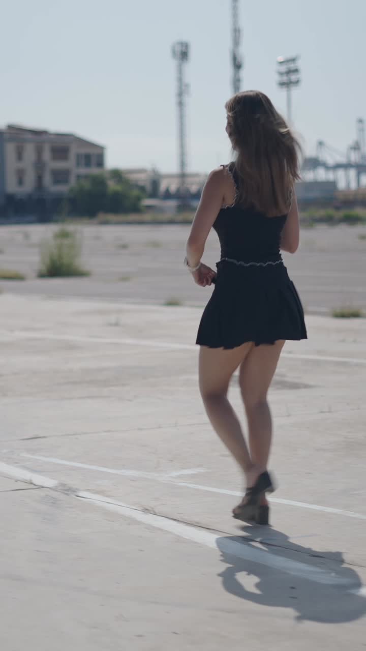 Woman walking in an urban environment