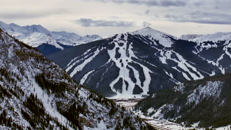 ski runs trails distant i70 copper mountain leadville colorado winter december christmas aerial drone cinematic landscape silverthorne vail aspen ten mile range cloudy rocky mountains left circle