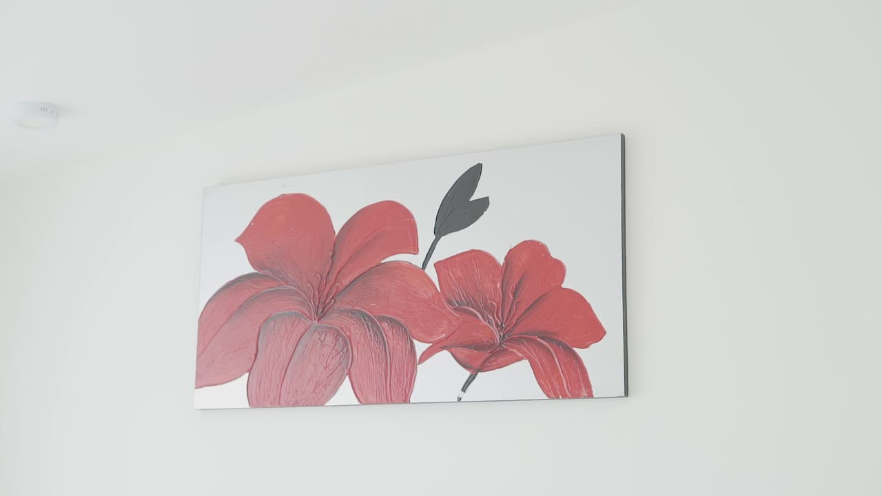 artist's painting with a red flower