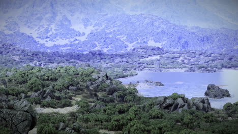 serene landscape with rocky formations and tranquil water body at dusk