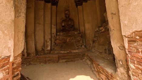 exploring a historic buddha statue in ayutthaya