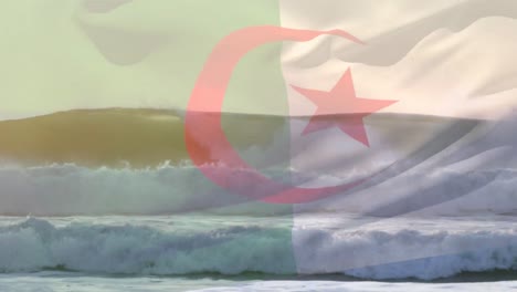 digital composition of waving algeria flag against aerial view of waves in the sea