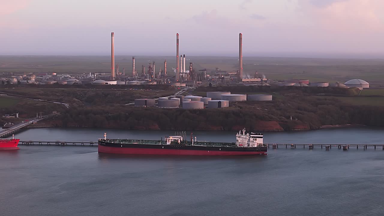 Valero Pembroke Refinery in the UK with a ship docked near the refinery
