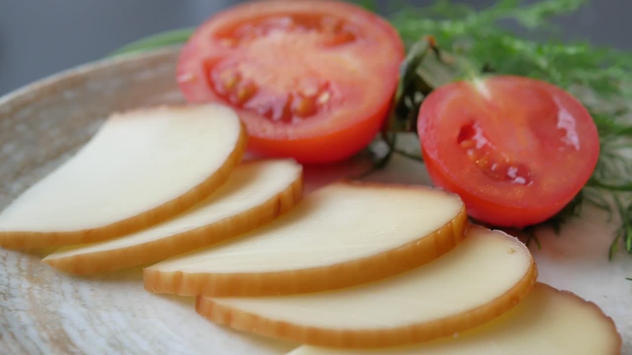 Sliced Cheese and Tomatoes on a Plate