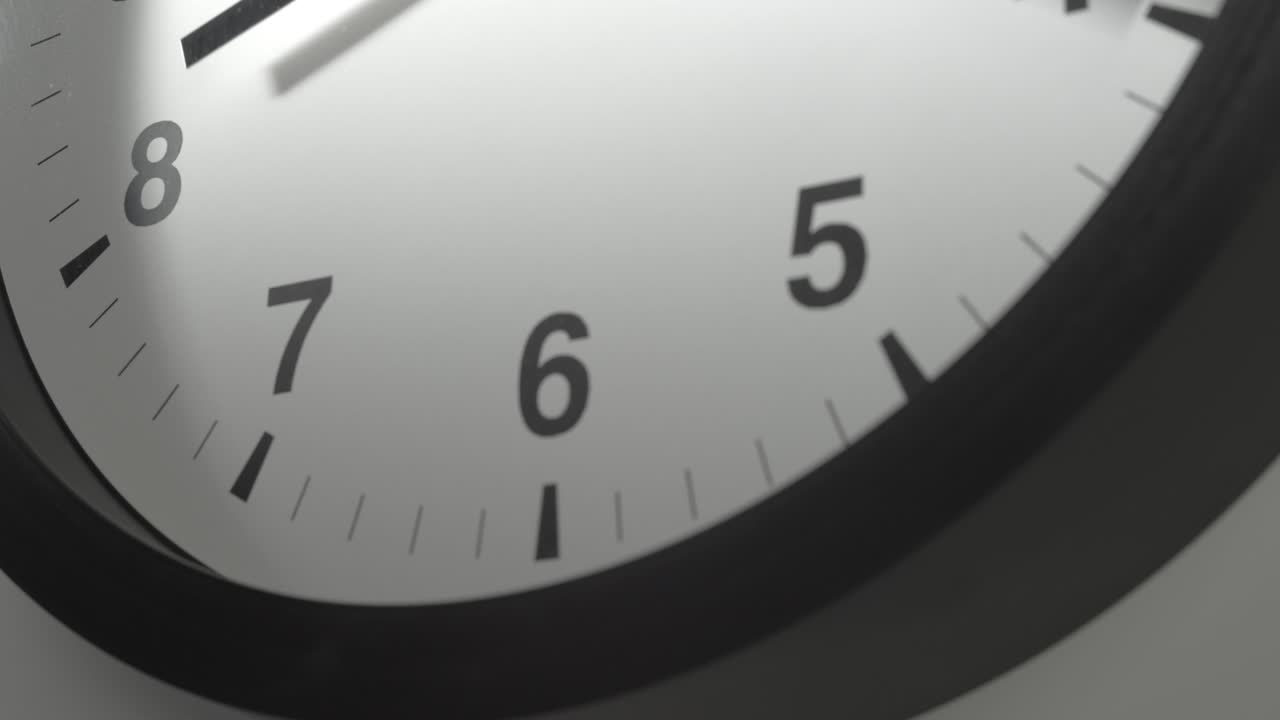 Clock Face in Time Lapse on White Wall in Office