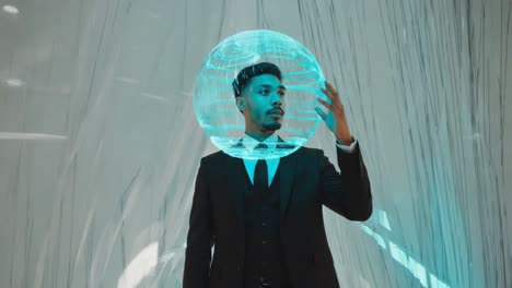 a man in a suit with a futuristic sphere